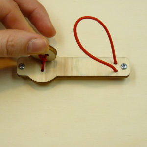 Knopf mit Unterlage